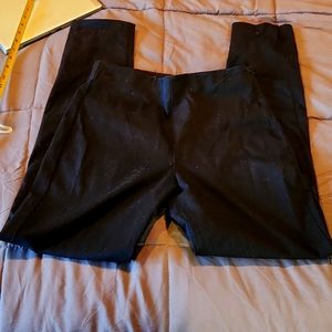 Size 8 tall black cotton skinny pants from Old Navy.